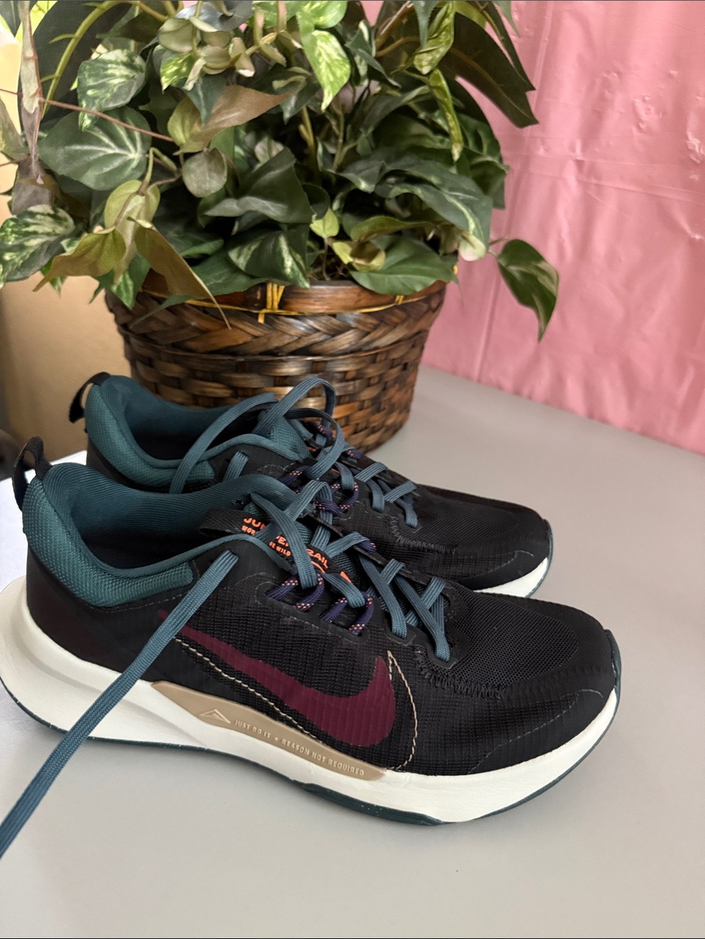 Nike Black Athletic Sneakers with Burgundy Swoosh and Teal Accents